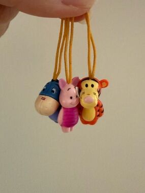 “peek a Pooh” figurines